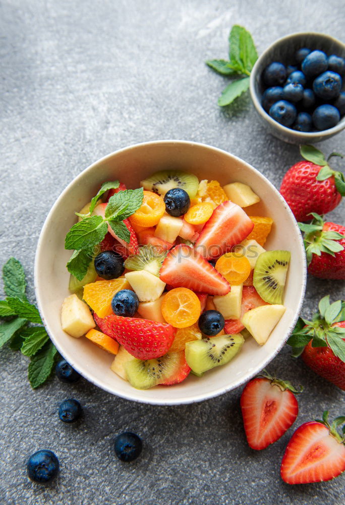 Similar – Acai bowl strawberry blueberry banana wooden table