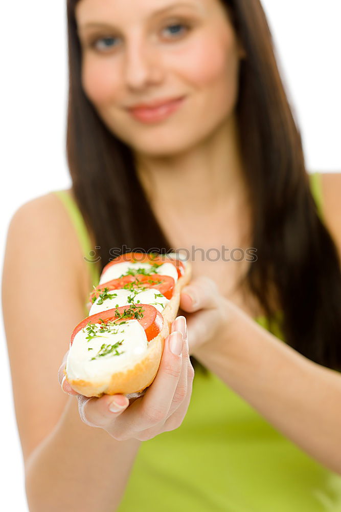 Similar – Content woman having meal