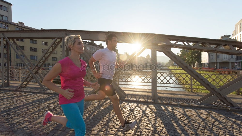 Similar – young woman runner eating an apple