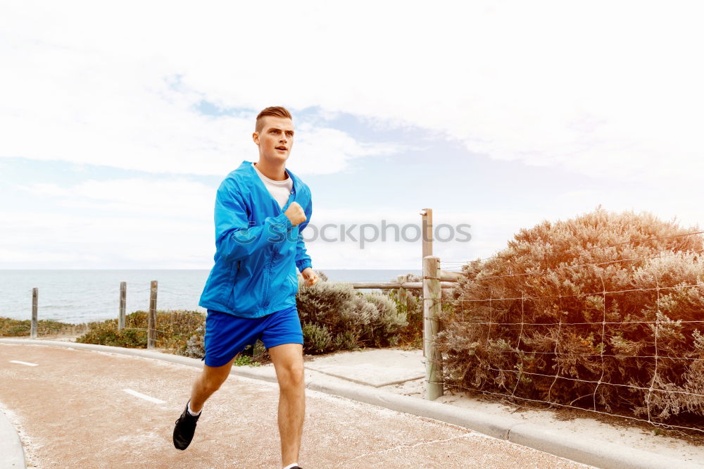 Similar – Young sports man is running up the stairs for his workout