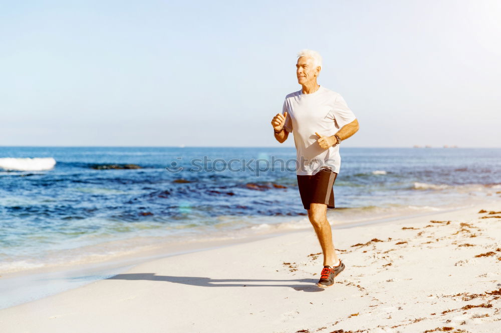 Similar – Image, Stock Photo swimmer putting on his wetsuit on the beach