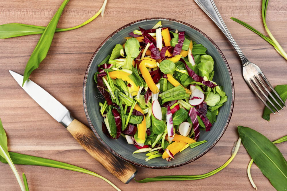 Similar – Spring salad of baby spinach, herbs, arugula and lettuce