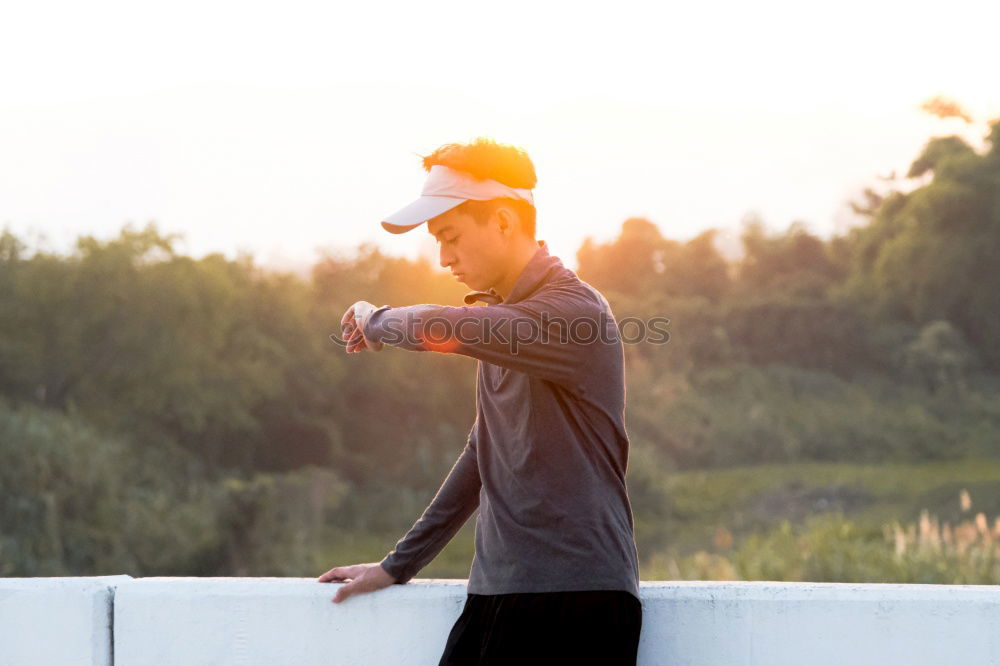 Similar – Image, Stock Photo Afro young man using mobile phone and fixed gear bicycle