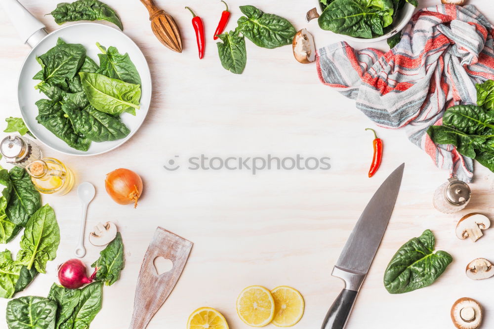 Similar – Empty plates and ingredients for spinach dishes