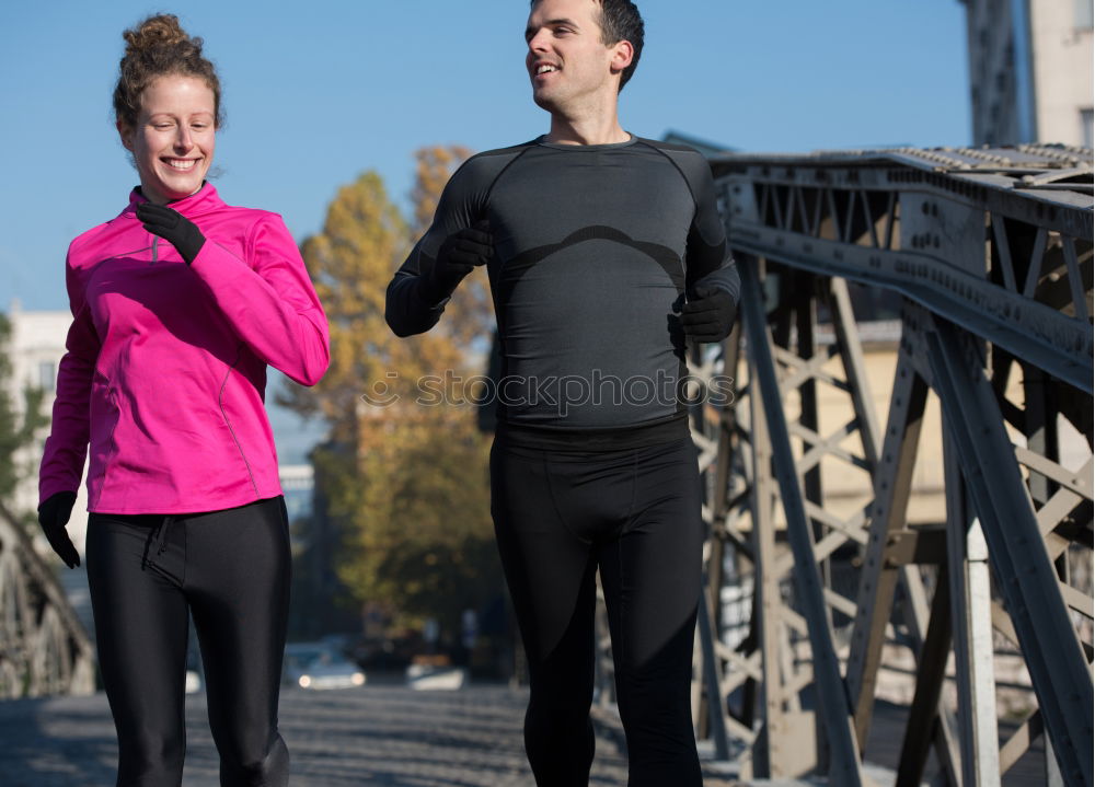 Similar – Image, Stock Photo Young couple exercising at the waterfront