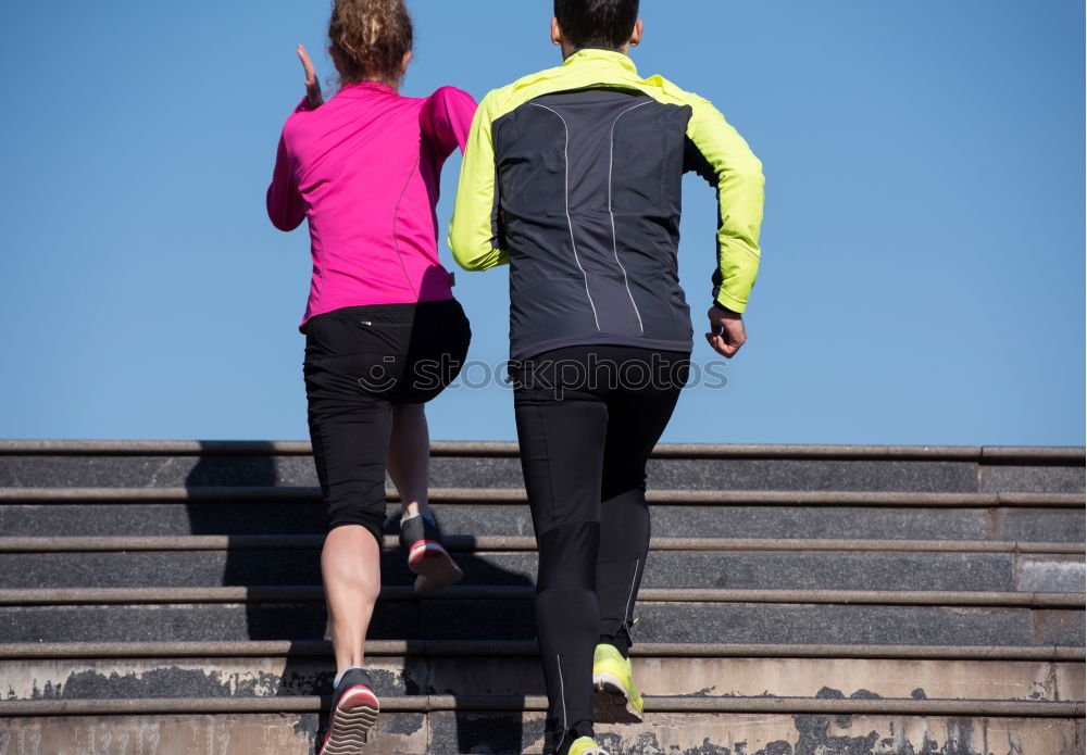 Similar – Image, Stock Photo Young couple exercising at the waterfront