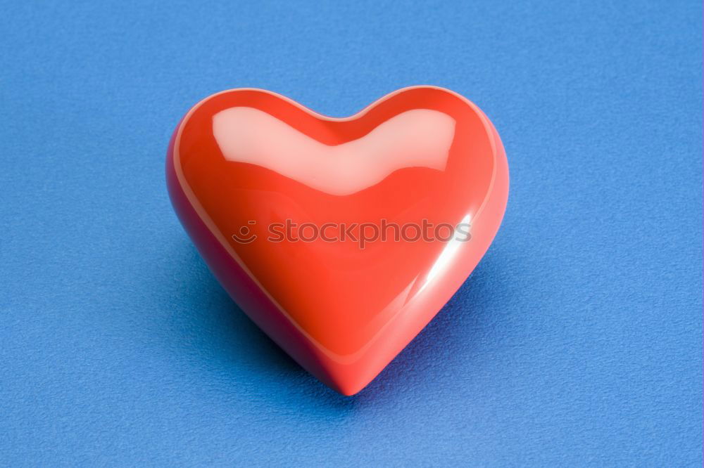 Similar – Image, Stock Photo Three stitched toy hearts, pink, red and teal on blue felt