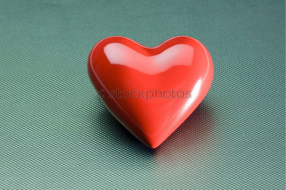 Similar – Image, Stock Photo Three stitched toy hearts, pink, red and teal on blue felt