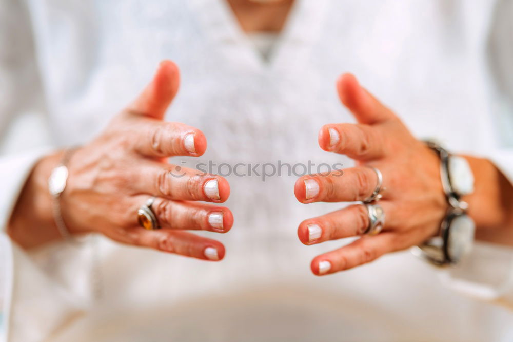 Similar – Image, Stock Photo A groom putting on cuff-links in his wedding day.