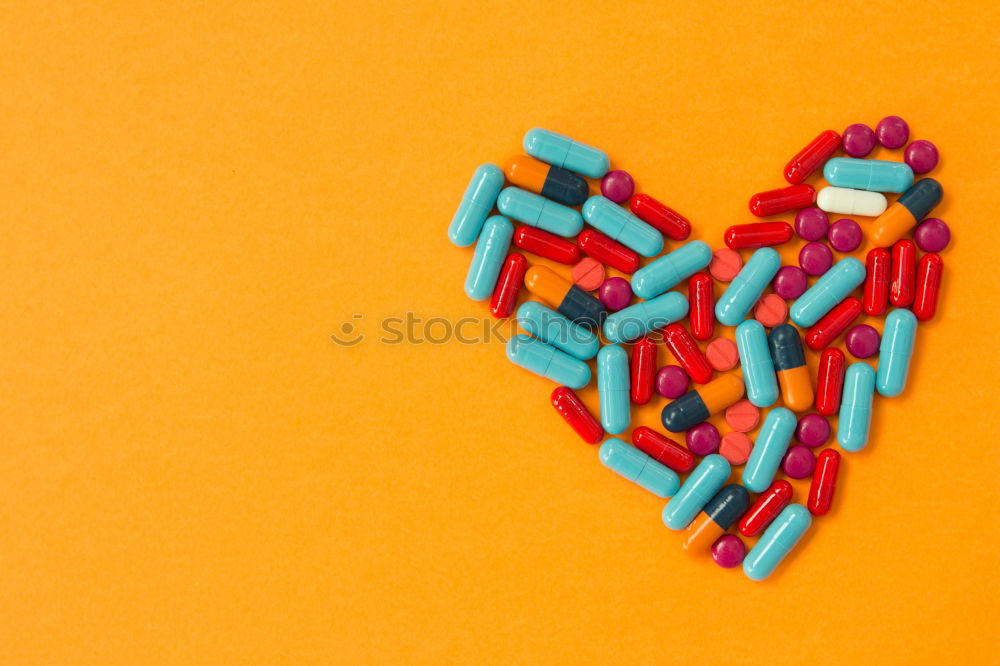 Similar – Image, Stock Photo Pills arranged in heart shape on an orange background