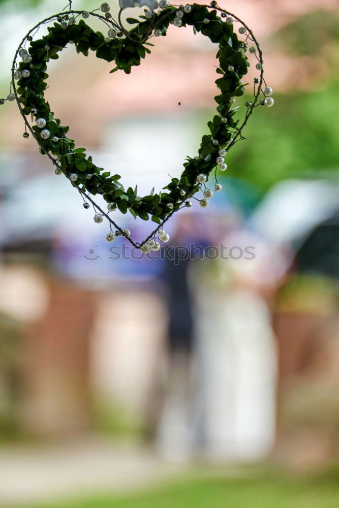 Similar – Stone heart shape on wood