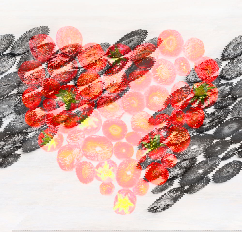 Similar – Image, Stock Photo Cut strawberries in heart form on turquoise blue