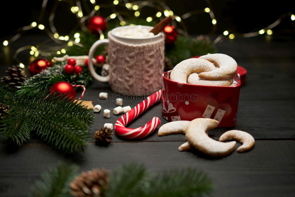 Similar – Image, Stock Photo Christmas decoration on a rustic wooden table.