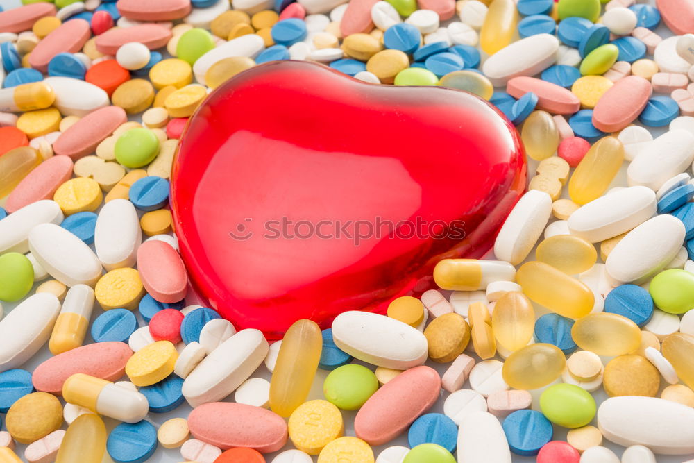 Similar – Image, Stock Photo Pills arranged in heart shape on an orange background