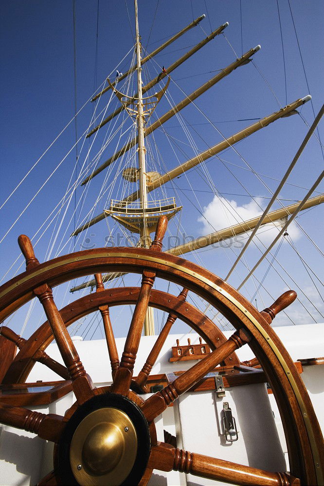 Similar – Steering wheel of a sailing ship