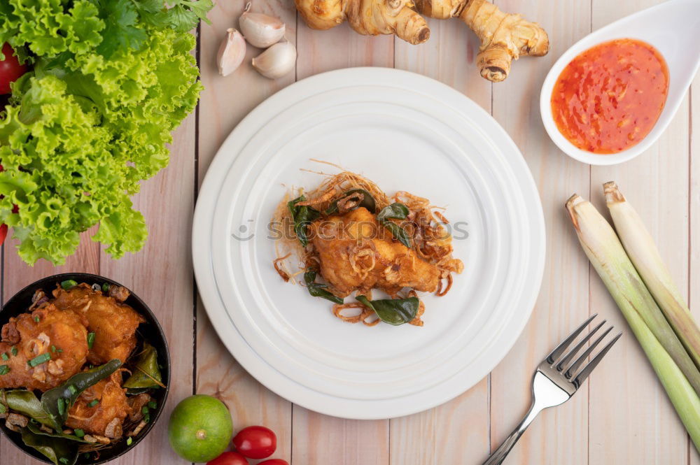 Schnitzel in old pan with meat fork