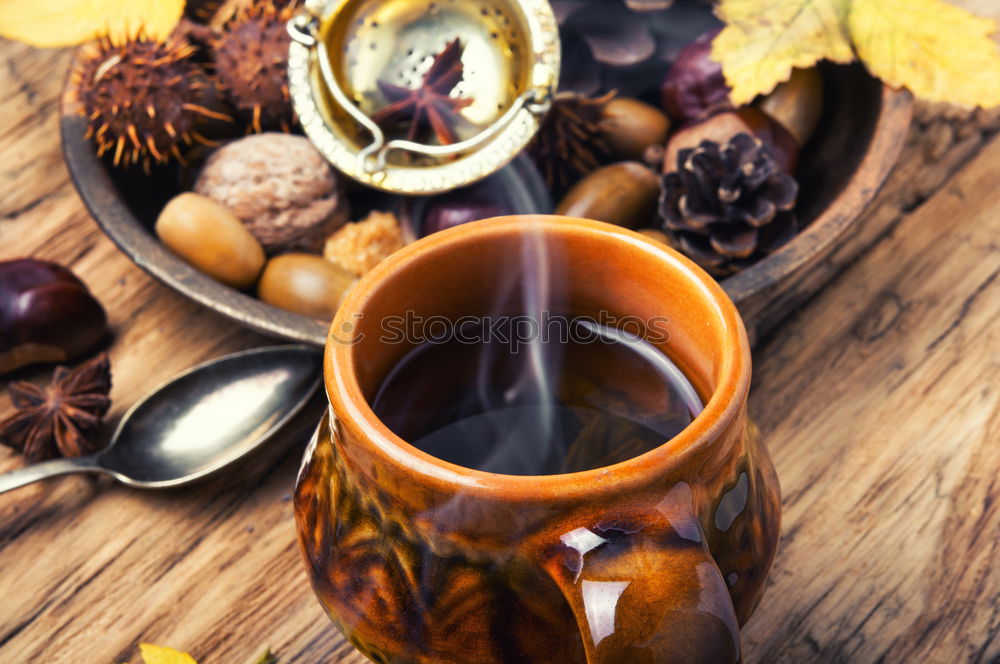 Similar – Tea brunch with coloured teacups, teapot and cake