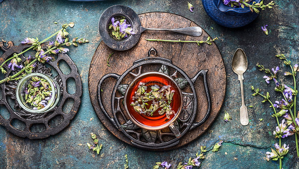 Similar – Herbal tea preparation with fresh flowers and wild herbs