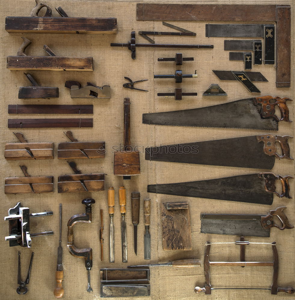 Similar – Cracking nuts with different tools, arranged next to crushed walnuts