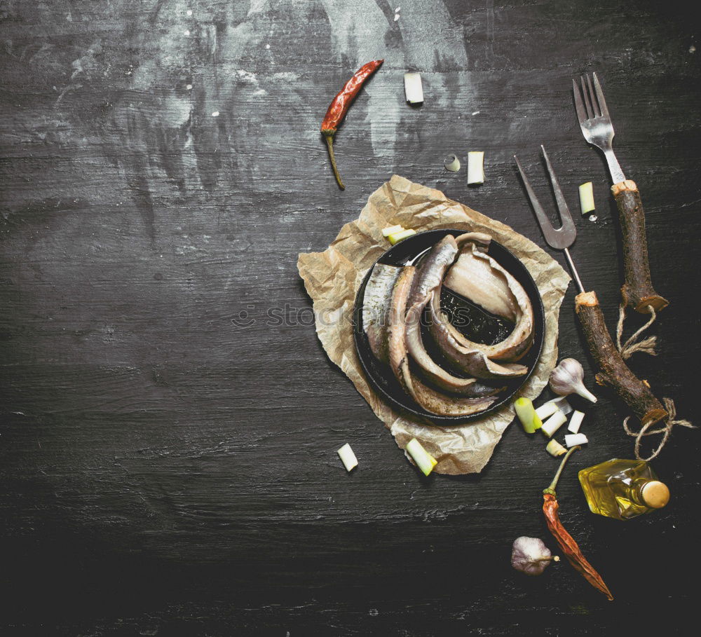 Similar – cutlery on the gray wooden surface