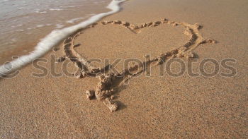 Similar – Heart on the beach Ocean