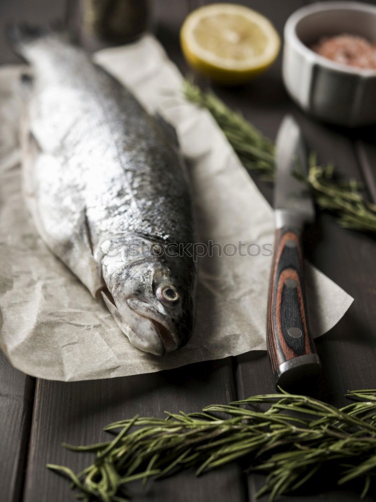 Similar – Image, Stock Photo Preparing whole salmon fish for cooking