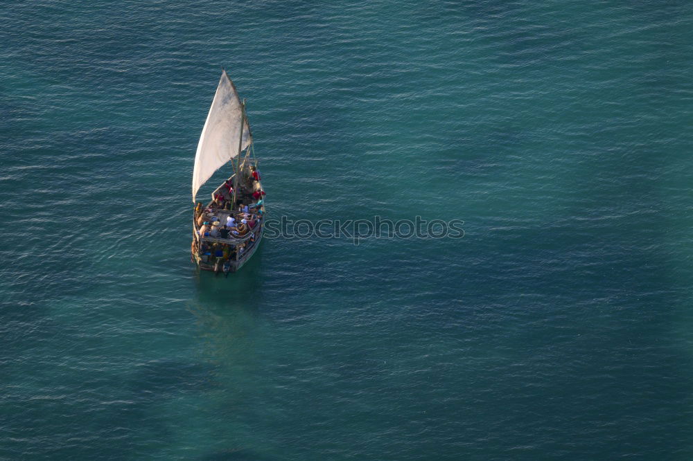 Similar – Sailing boat on blue Lake Garda II