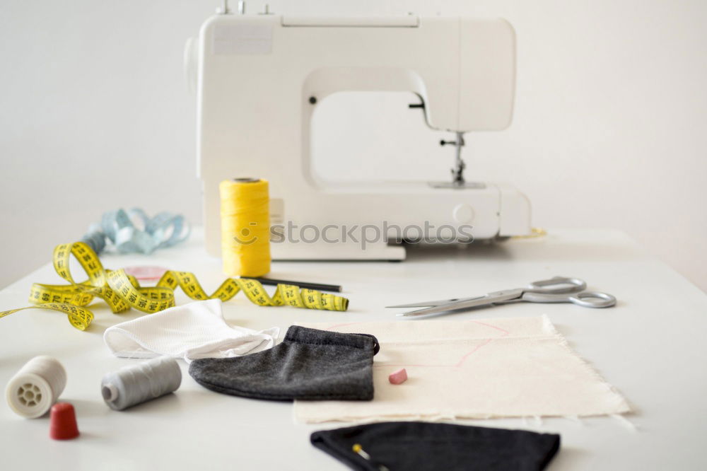 Similar – Image, Stock Photo Desk of fashion designer with sewing machine and tools