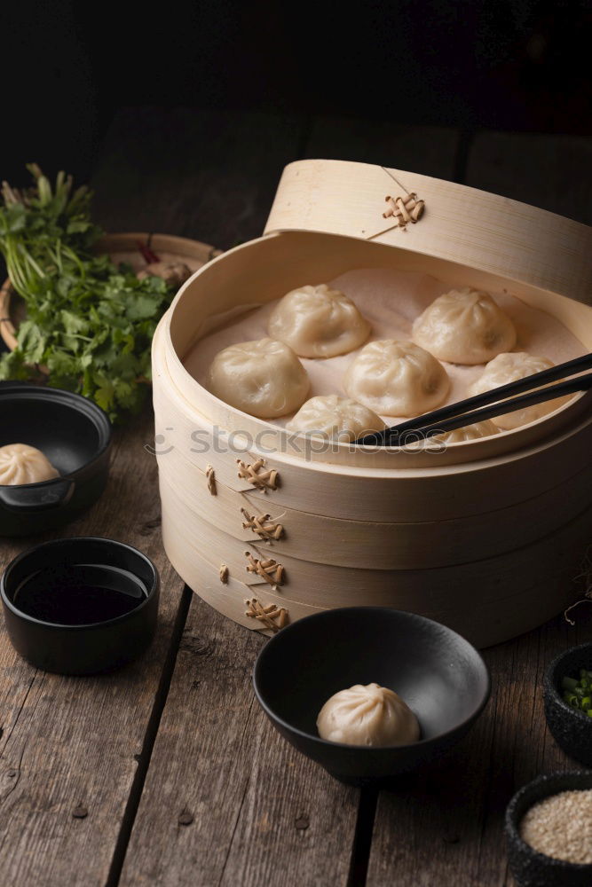 Similar – Geometric bowl of Asian Noodle Soup with chopsticks