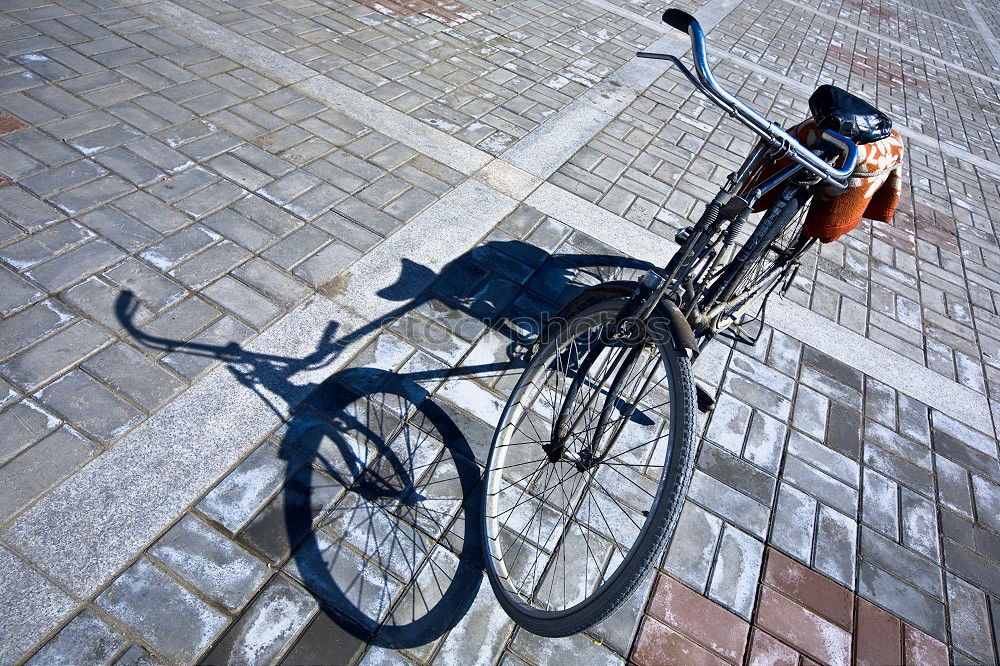 Similar – Image, Stock Photo Classic Holland bike in beige with saddle cover in front of a matching house wall in Cologne on the Rhine in North Rhine-Westphalia