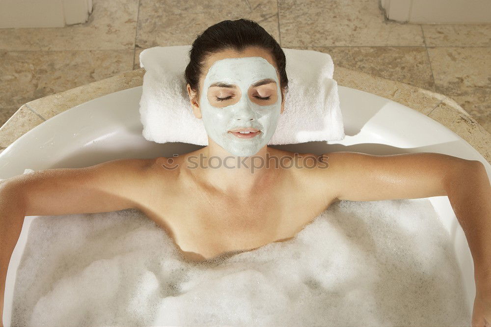 Similar – Woman lying in tub doing hydrotherapy treatment