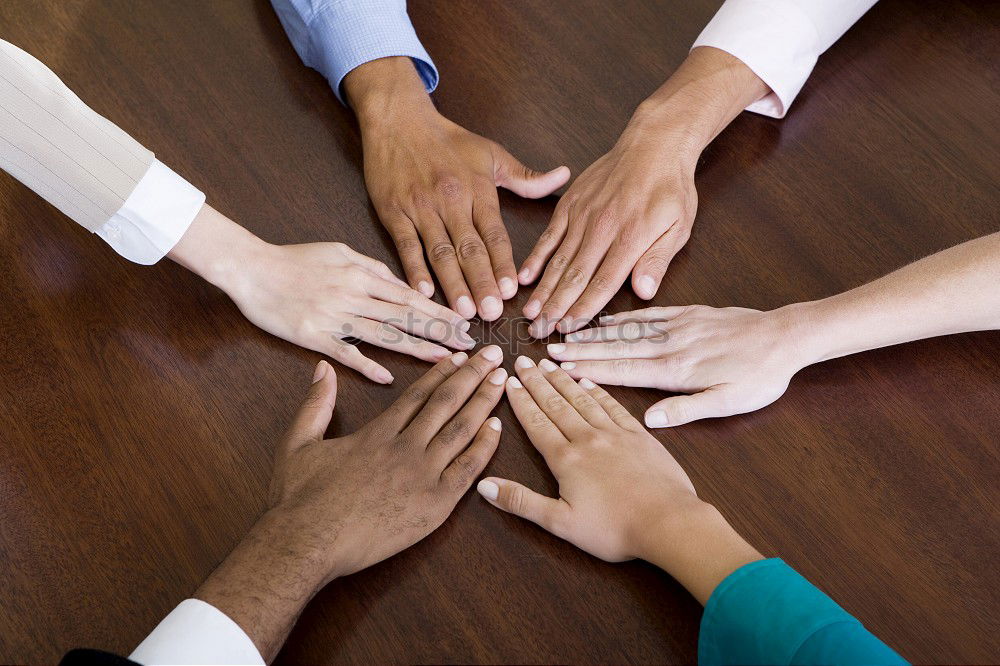 Similar – Image, Stock Photo Multiracial young people putting their hands together