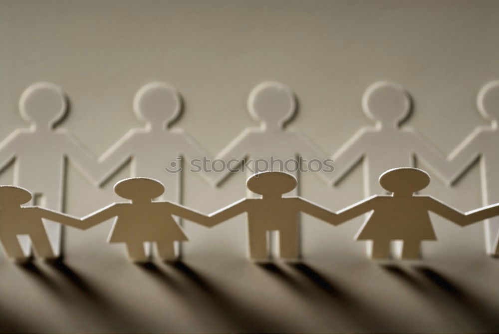 Similar – Paper made people figures