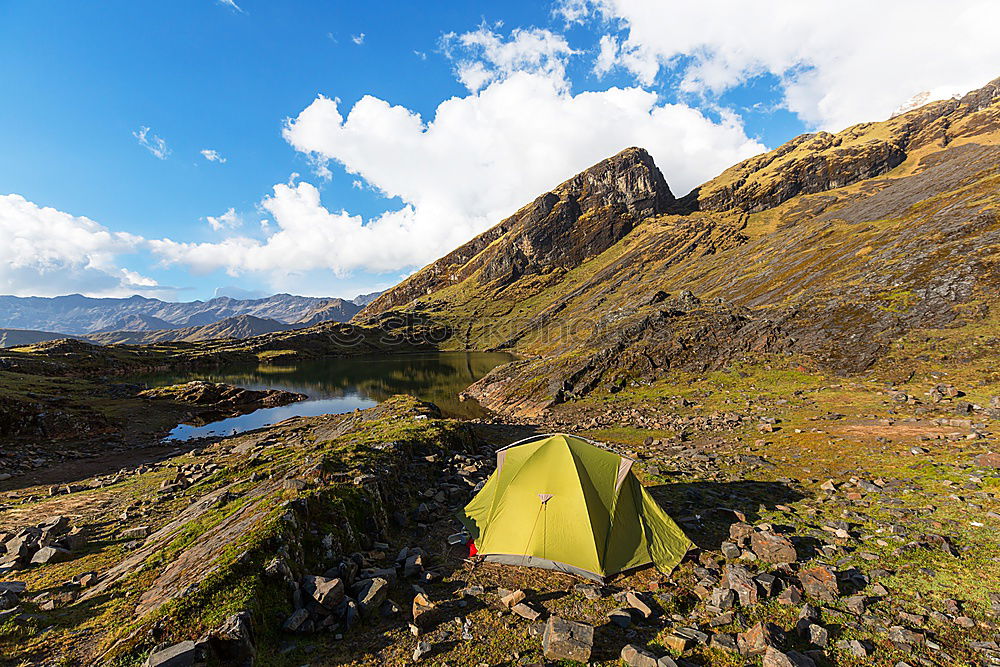 Similar – Image, Stock Photo Green tent on the green lawn in snow mountains