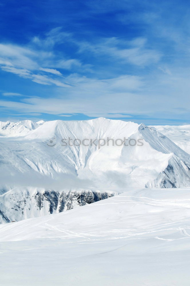 Similar – Mountain peak in snow