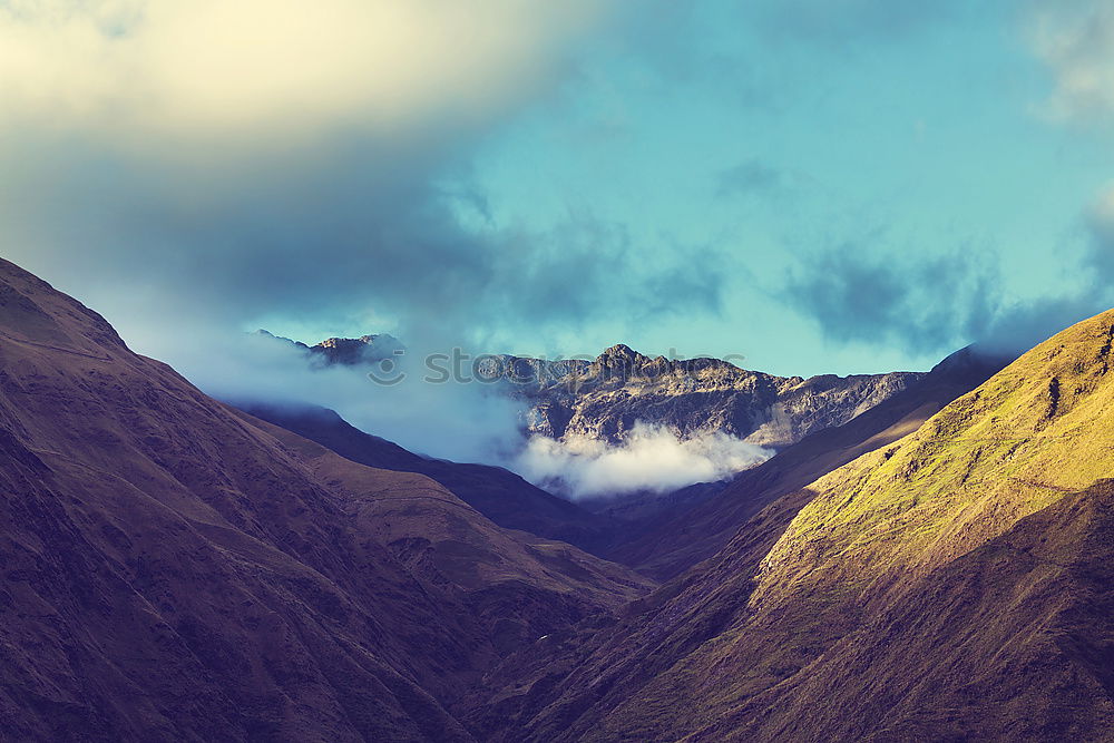 Similar – A photographer takes pictures of the view on Isle of Skye