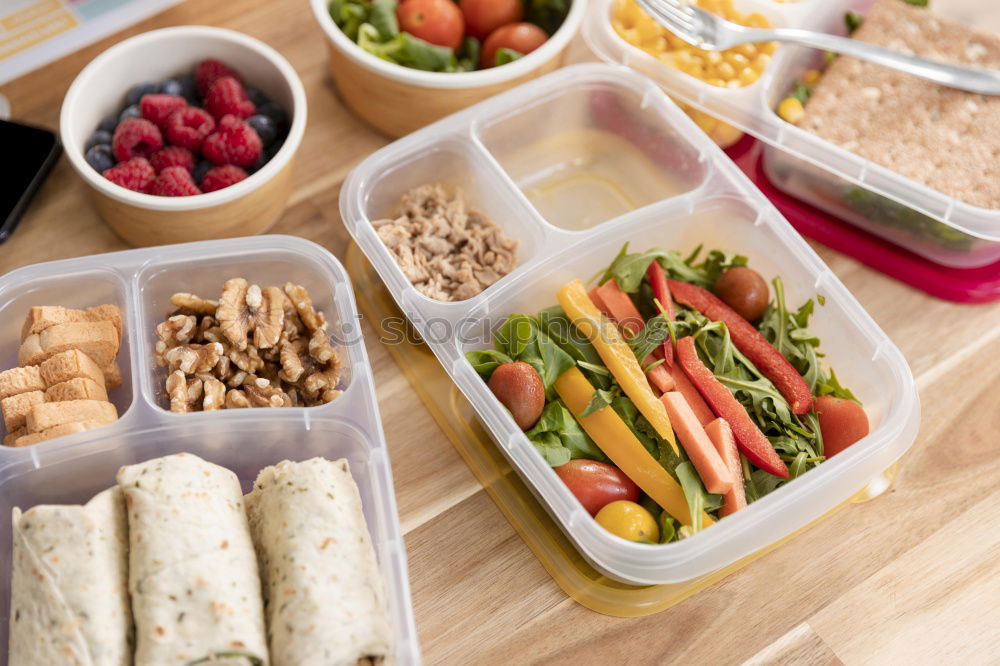 Similar – Healthy vegetarian lunch box with tortilla wraps