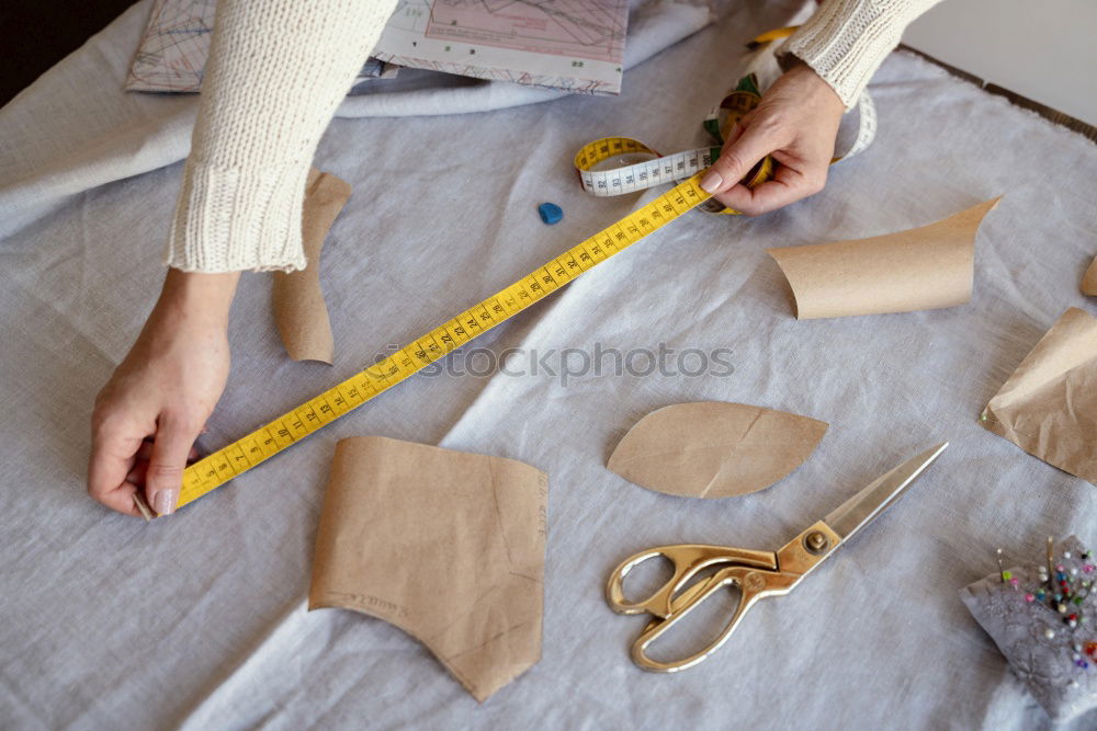 Similar – Image, Stock Photo Top view of woman working with sewing machine in her workshop