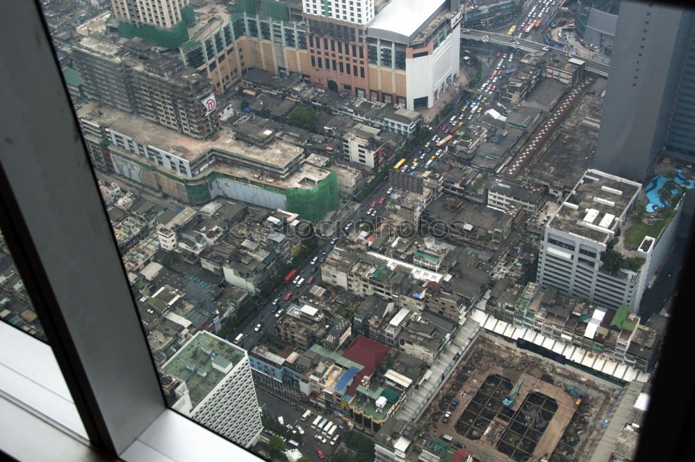 Similar – View out of the window of a high-rise building on the area around Frankfurt’s railway station