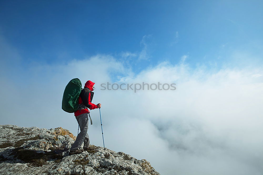 Similar – Lighthouse above the clouds.