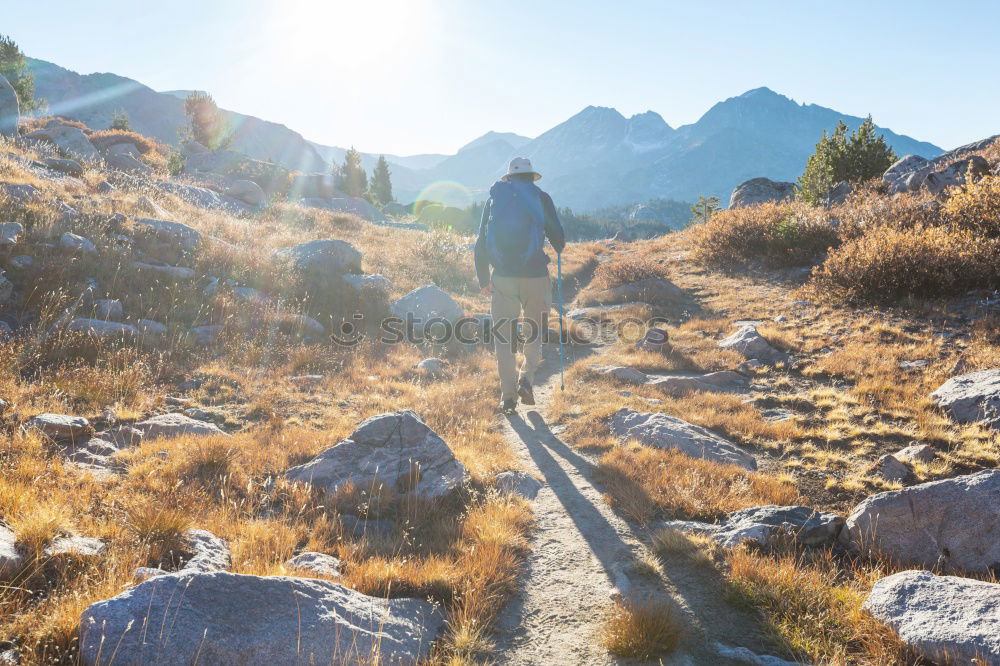 Similar – Image, Stock Photo Young woman on long-distance hiking trail