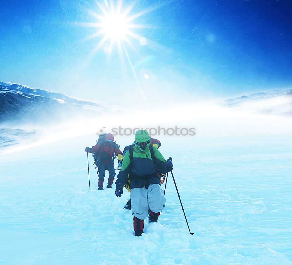 Similar – Image, Stock Photo Mountaineer reaches the top of a snowy mountain