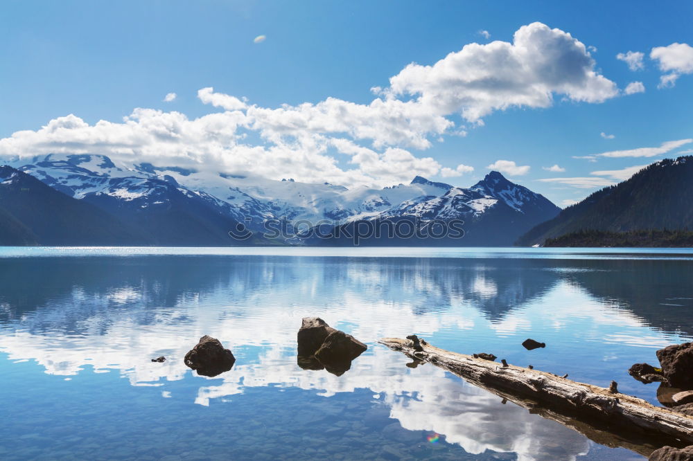 Similar – Image, Stock Photo Woman on a deck over an alpine lake