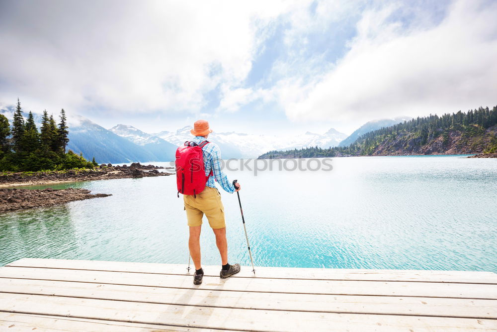 Similar – Image, Stock Photo Happy family standing near the lake at the day time.