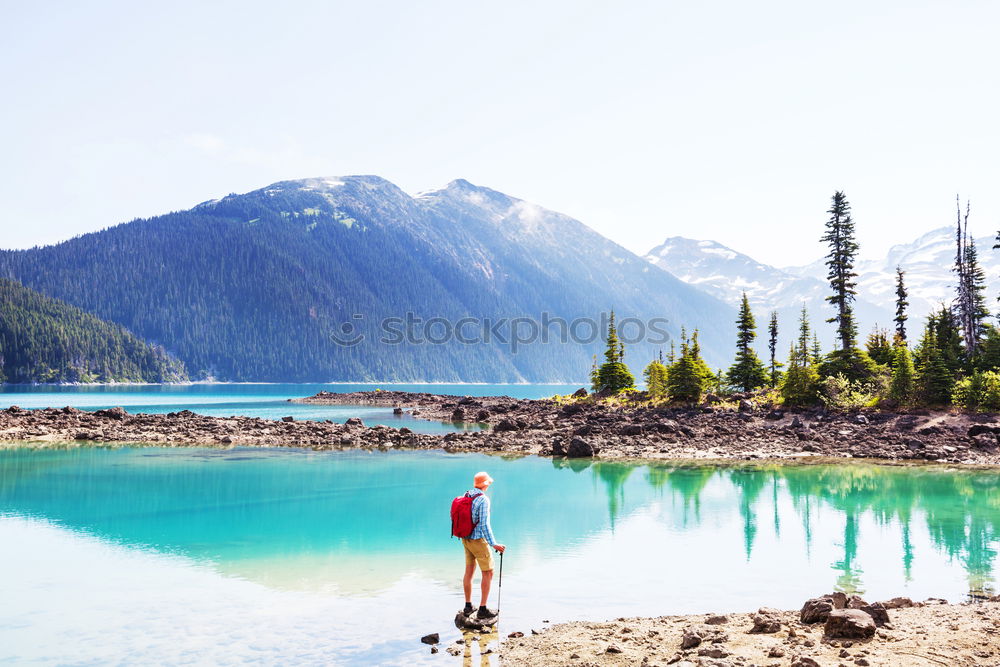 Similar – Image, Stock Photo Girl sitting on a deck over a lake