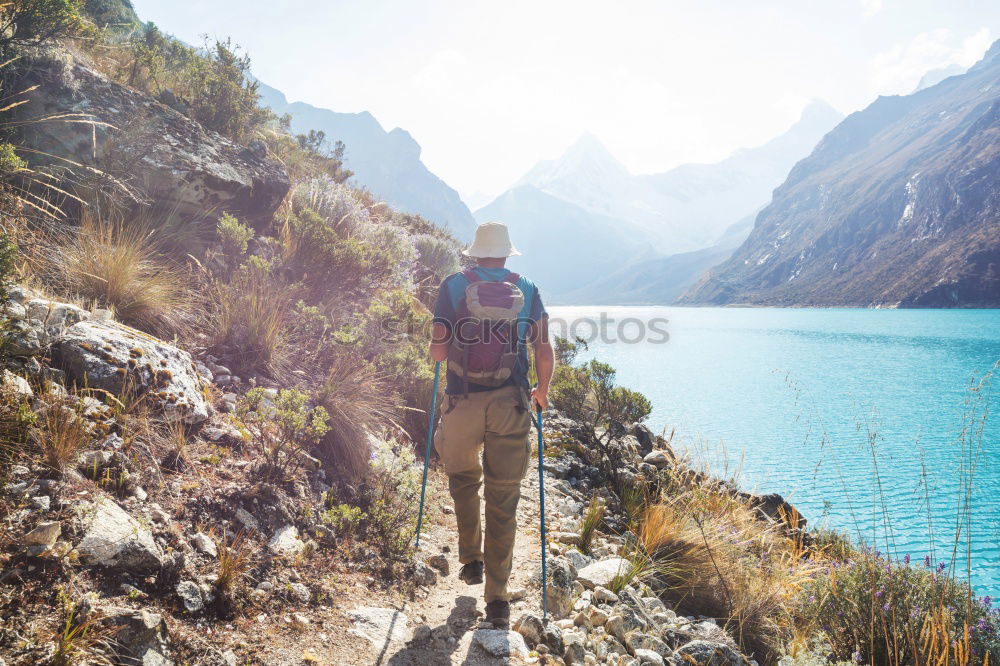 Similar – Image, Stock Photo Tourist looking at riverside town