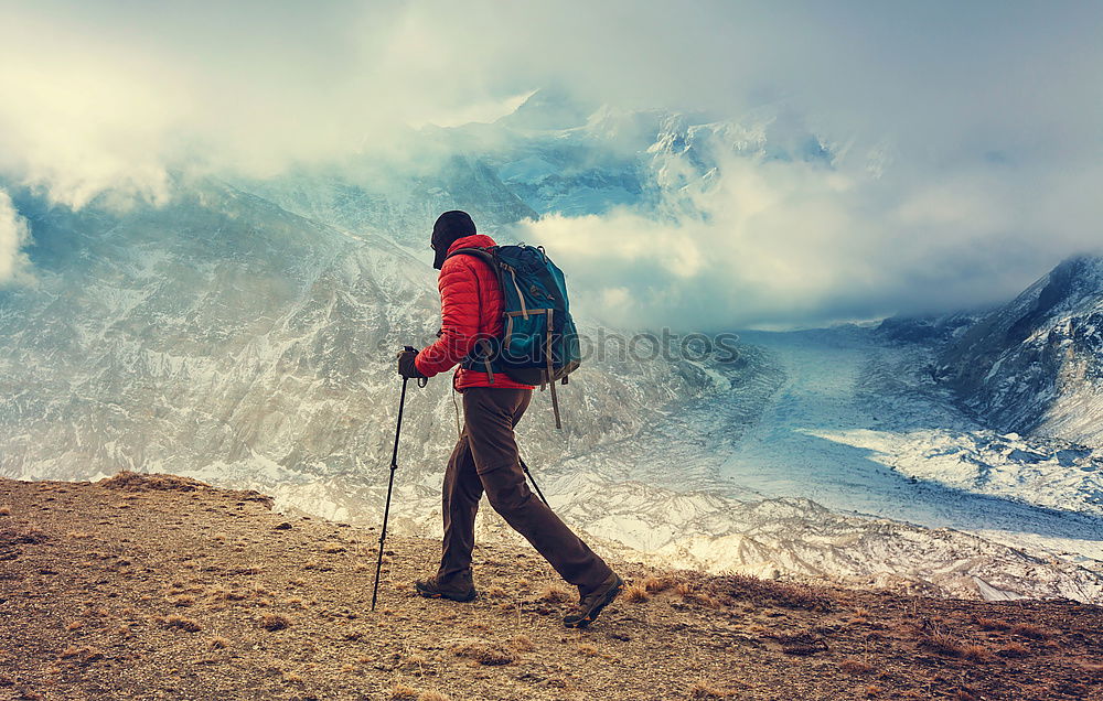 Similar – Image, Stock Photo Young woman hiking, Timmelsjoch E5.