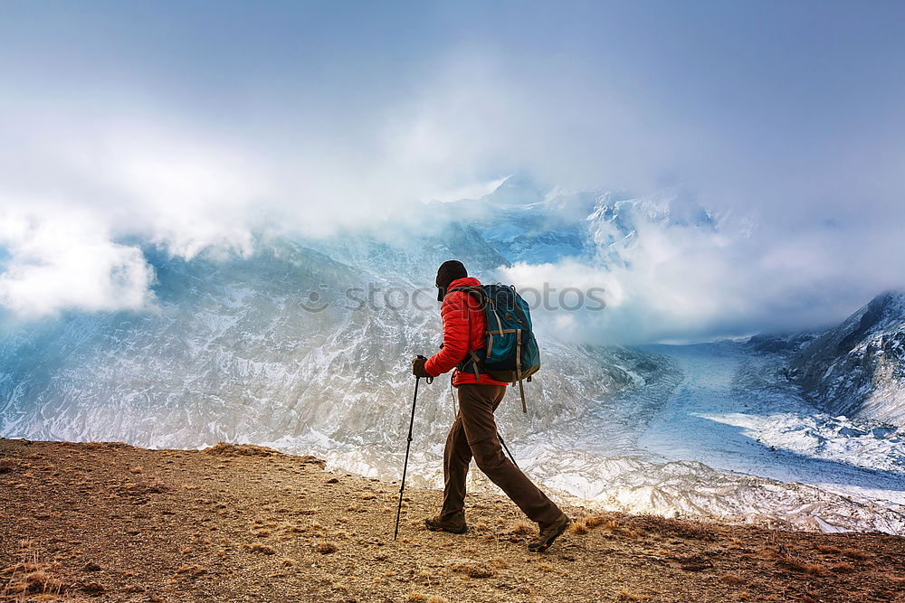 Similar – Four people with hiking backpacks, mountain landscape, Scandinavia