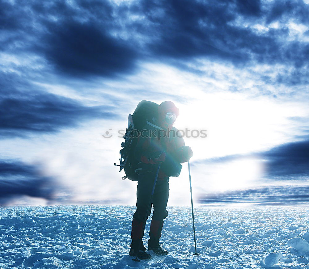 Similar – Image, Stock Photo Mountaineer at the top of a snowy mountain