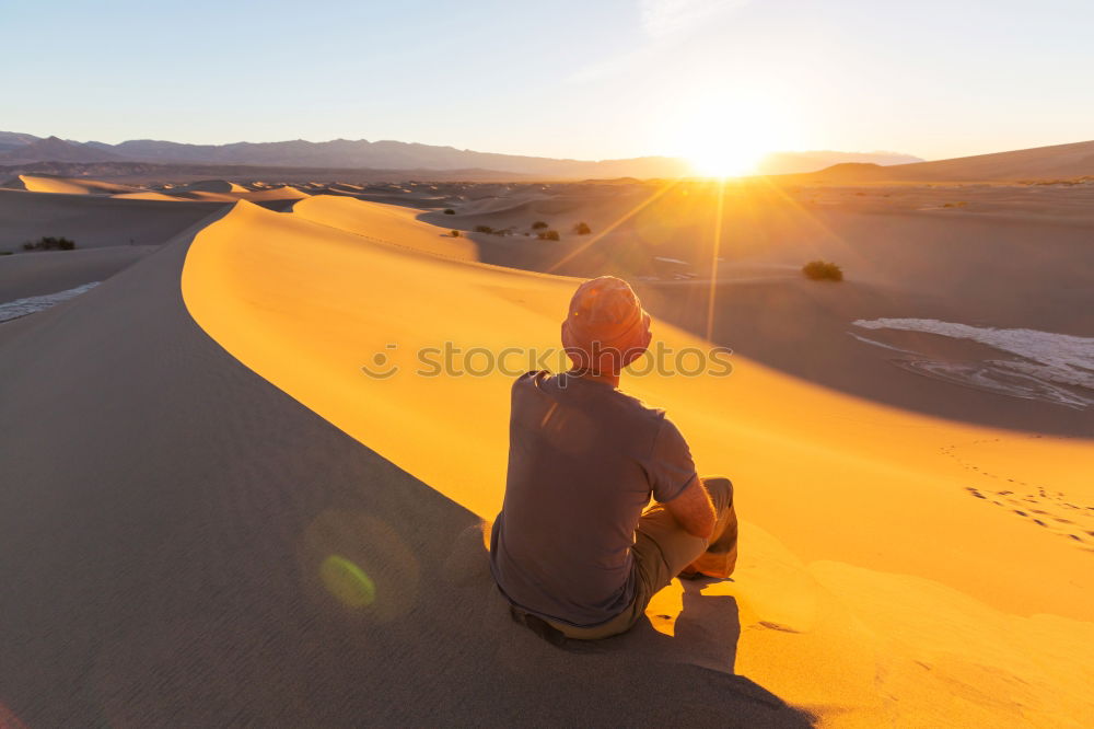 Similar – Hiker in the desert.